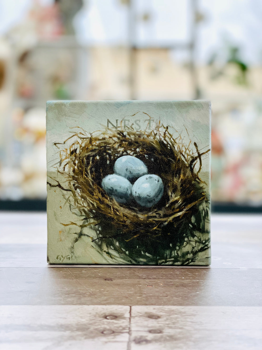 Nest Hanging Sign